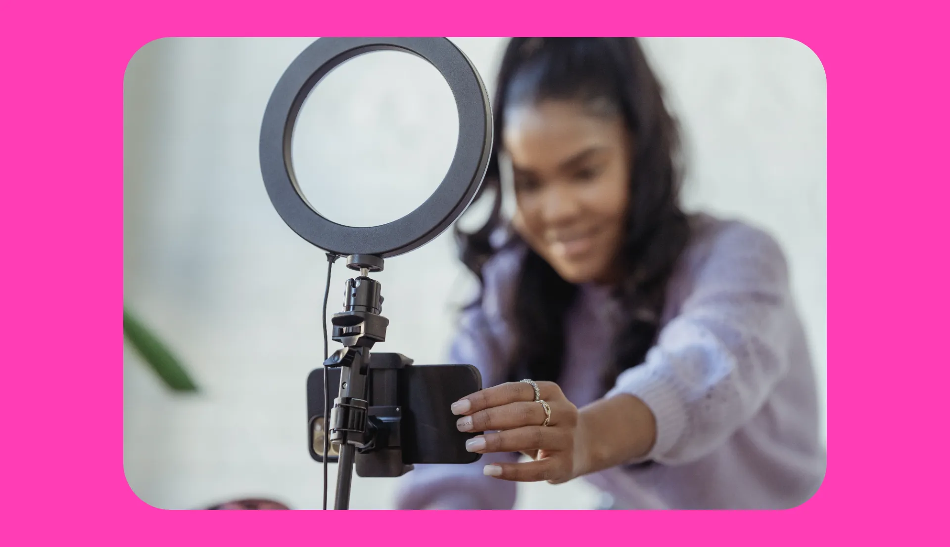 woman filming herself for social media content