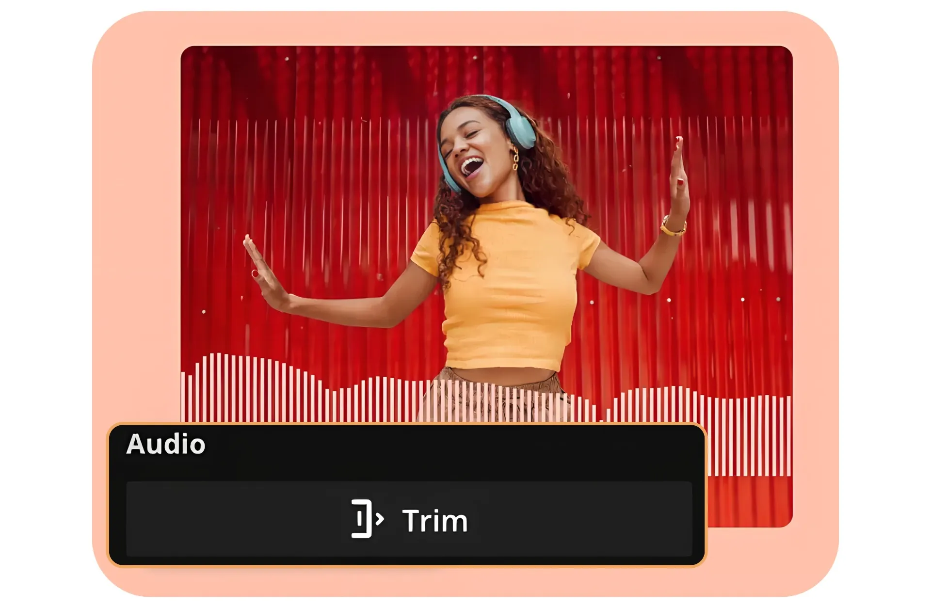 Woman wearing headphones and dancing to music against a red wall.